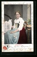 Dame in Appenzeller Tracht in einer Stub