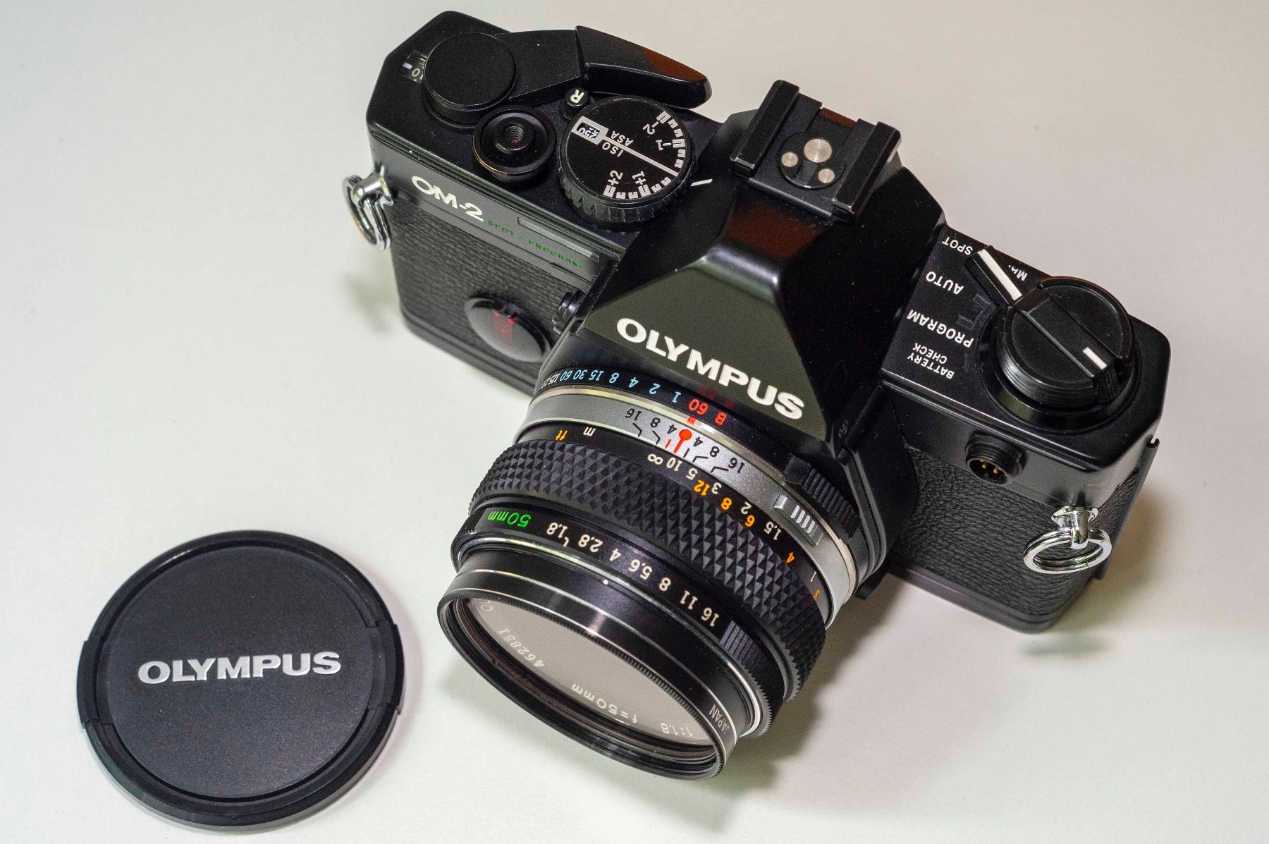 Olympus Kamera: Olympus OM-2 Spot / Program mit Zuiko 50/1.8 – Gebraucht aus Schwerzenbach von floridan