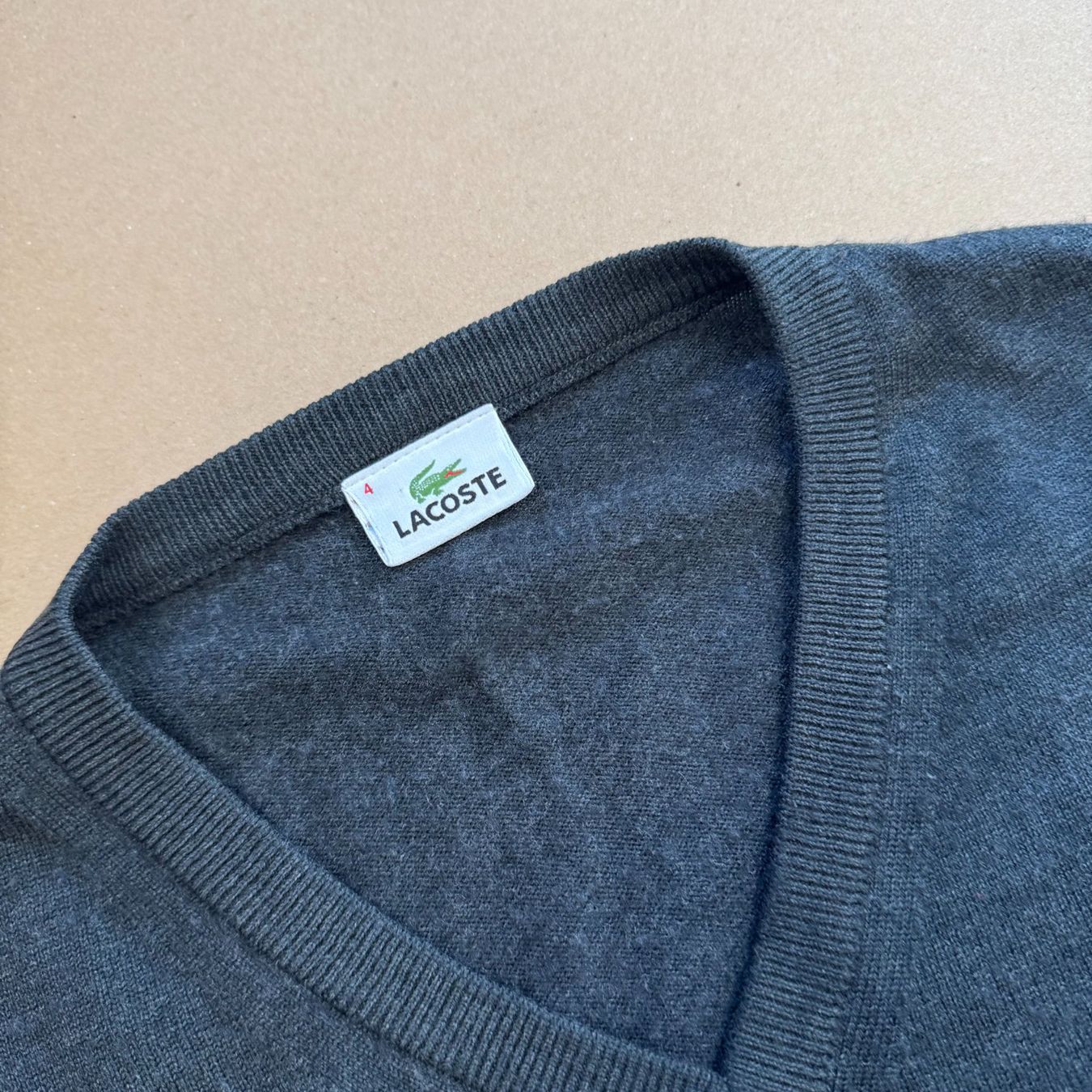 Lacoste Maglioni & Felpe: Vintage Lacoste v-neck sweatshirt Pulloveer 90s – Usato da St. Gallen venduto da sourced_limited 1