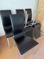 6 Stühle aus Leder, schwarz 