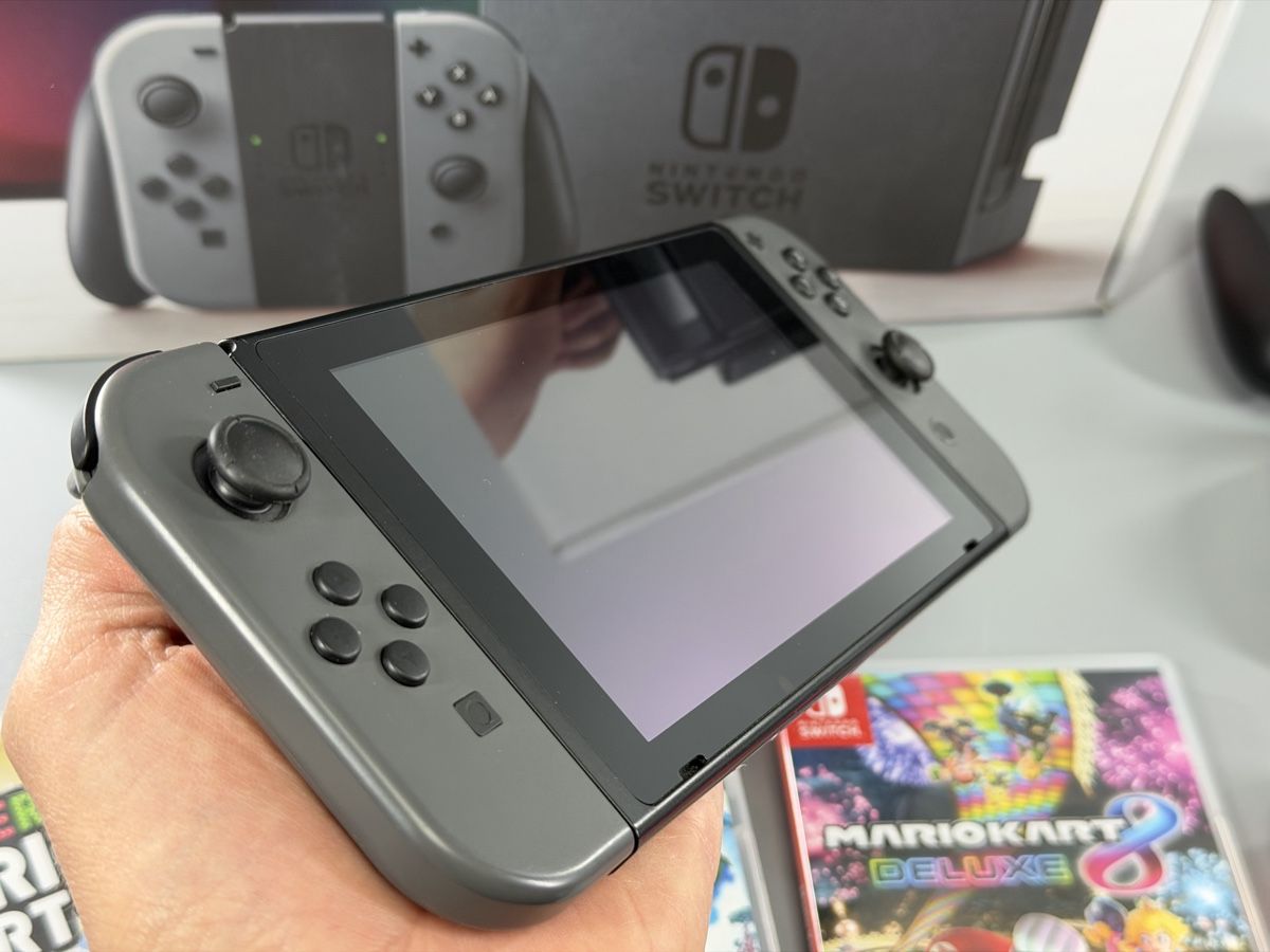 Nintendo Console: Nintendo Switch Grau + 3 Games - Top Zustand! – Usato da Sennhof venduto da Johnbest 2