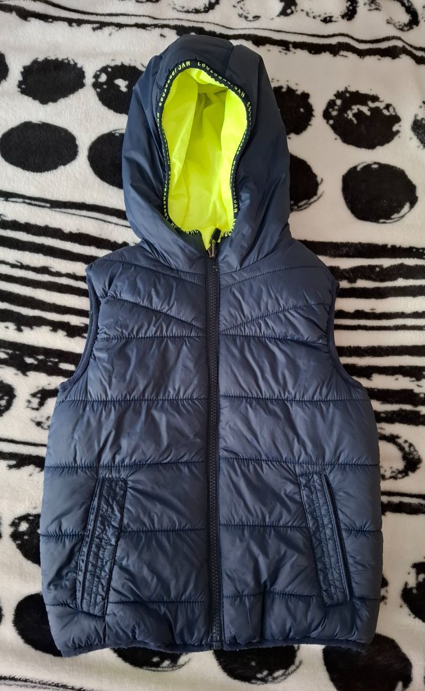 C&A Altro abbigliamento per bambino: Wendegilet gr.122 Blau/Gelb – Usato da Oberurnen venduto da rotty80