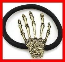 Haargummi Haarschmuck Skeletthand GOLD Knochen Haarband