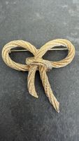 Broche vintage Christian Dior noeud doré, Chic!