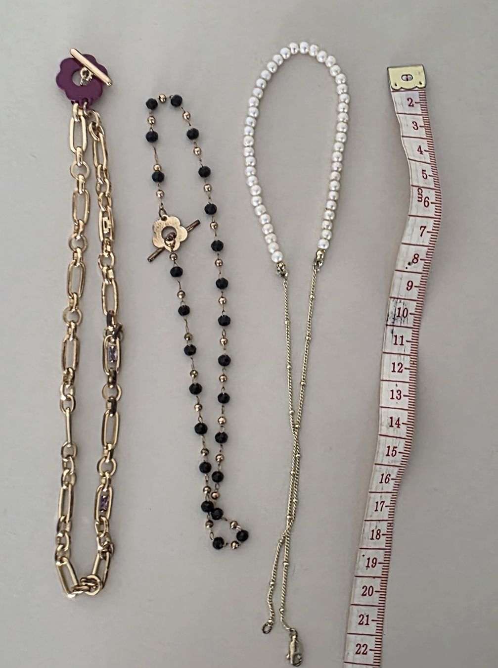 Altri gioielli: 3 colliers doré fleurs/perles fermoir en T / toggle clasp – Usato da La Sarraz venduto da lupintoro