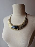 Collier doré et noir