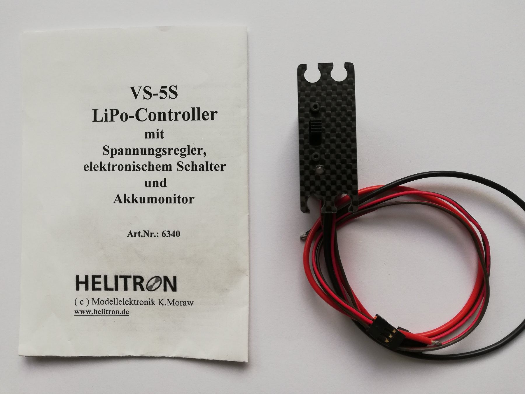 Modellismo RC: Lipo-Controller Helitron – Nuovo e nell'imballaggio originale da Flüh venduto da AMS-Modellbau 1