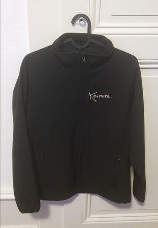 Veste zippée noire Softshell avec manchots au dos. Taille S