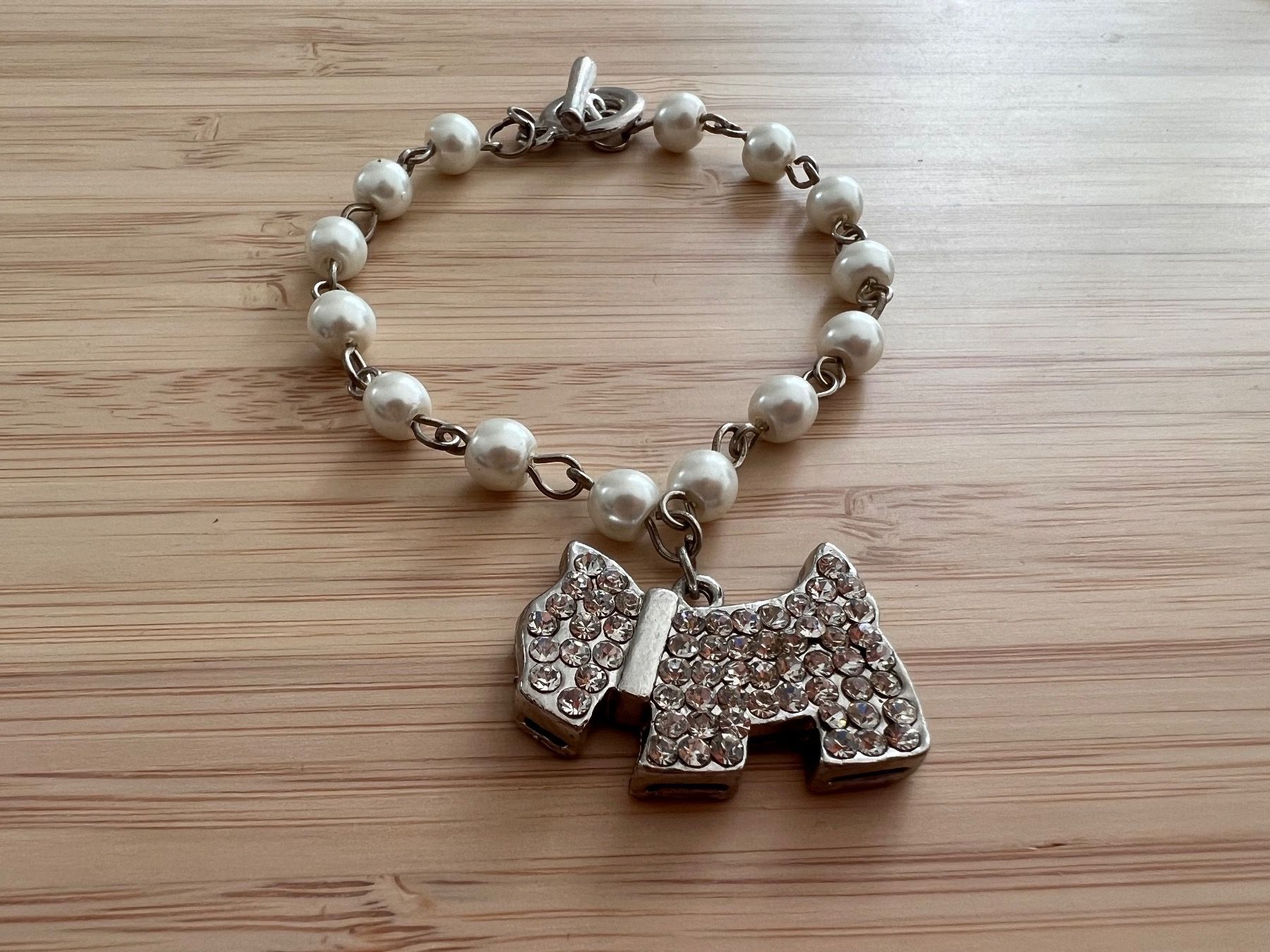 Bracciali & Braccialetti: Pearl puppy bracelet – Usato da Genève venduto da Ballpencase