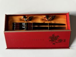 Beautiful Asian chopsticks with ducks shape holder