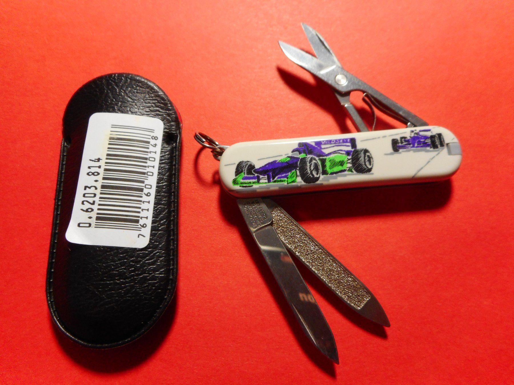 Coltelli tascabile: Victorinox Classic - Grand Prix – Nuovo e nell'imballaggio originale da Rotkreuz venduto da Hubbil