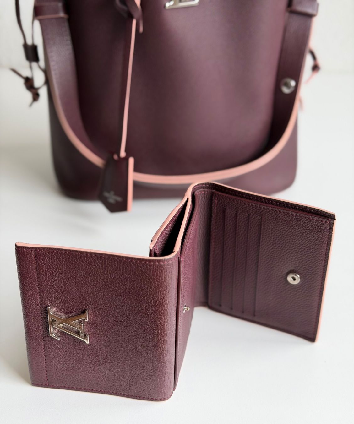 Louis Vuitton Portamonete: Louis Vuitton Portefeuille Lockme – Usato da Reinach AG venduto da BisMad3 3