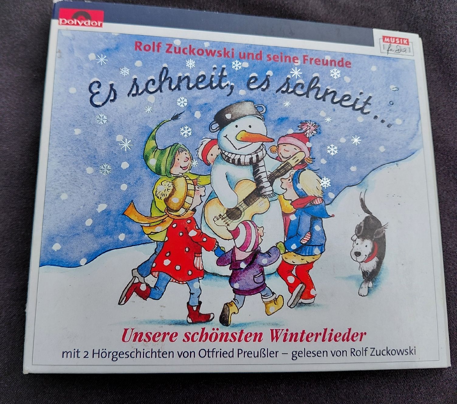 CDs: Es schneit, es schneit – Winterlieder von Rolf Zukowski – Gebraucht aus Geuensee von sonnenstunden
