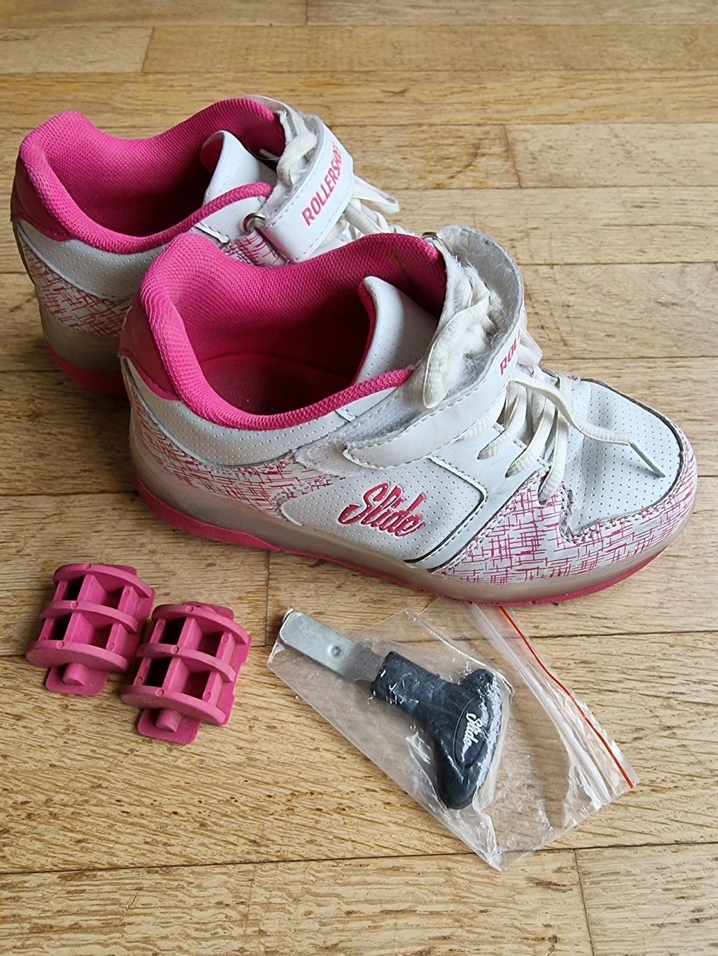 Scarpe per ragazzi: Rollershoes Slide weiss/rosa Gr. 32 – Usato da Buchrain venduto da Xaro01 1