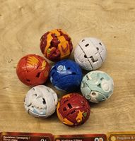 Bakugan Konvolut 7 Figuren mit Karten gebrauchter Zustand
