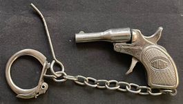 Schlüsselanhänger Mignonnette Colt Revolver Metall, vintage