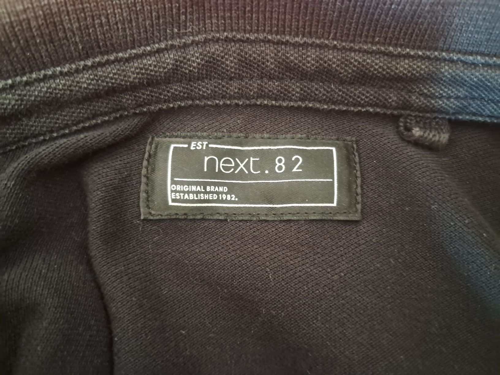 Next Chemises, T-shirts & Polos: Polohemd Next.82 schwarz  – D'occasion à Biel/Bienne par sof_yx5y 2