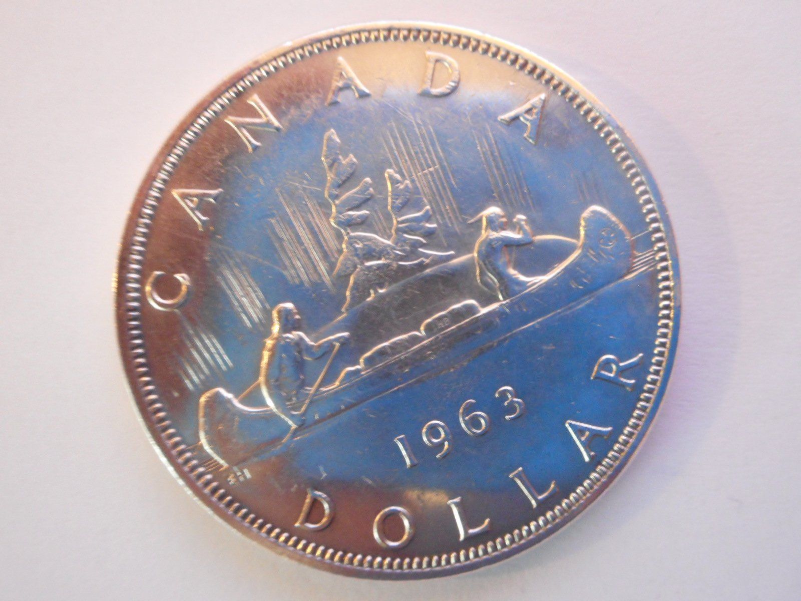 Tutti le monete: 1963  1 Dollar Canada Kanu silber  23.3 gr. – Nuovo (secondo la descrizione) da Kriegstetten venduto da pizlad2010 1