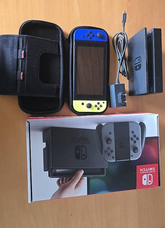 Konsolen: Nintendo Switch Complet mit 3 Spielen  – Gebraucht aus Luzern von 40carti 2