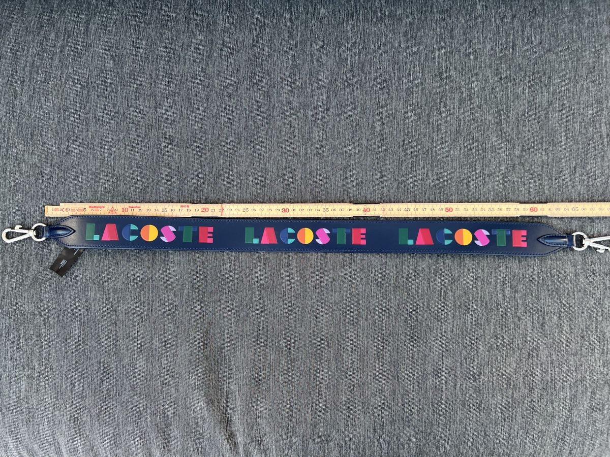Fibbie per cinture: Lacoste Schultergurt 70cm Blau Leder NEU – Nuovo e nell'imballaggio originale da St. Gallen venduto da Mokki2014 2