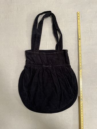Borsa Subdued a coste con fiocco blu.
