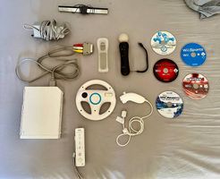 WII complète- avec volant - télécommande - curseur - 5 jeux