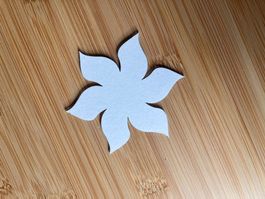 1 kleiner selbstklebender Plastikspiegel Blume