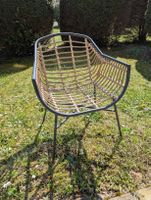 Deux fauteuils d'extérieur en rotin synthétique
