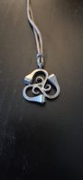 Pendentif clou fer à cheval triskel