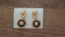 boucles d'oreilles dorée et noir