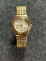 Swatch Irony Damenuhr gold mit Zifferblatt Römische zahlen
