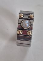 Magnifique bague en or 750 et acier
