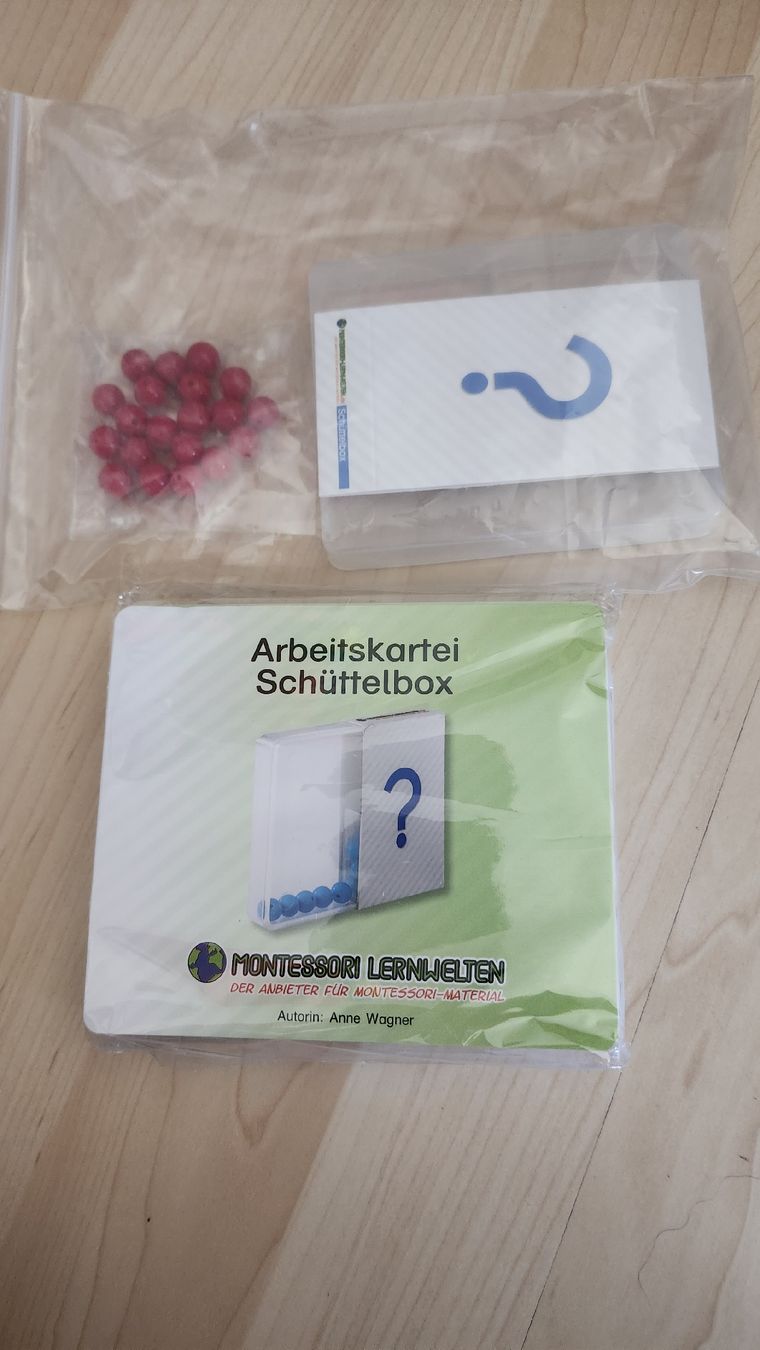 Giochi: Montessori Schüttelbox mit 20 Perlen plus 55 Arbeitskarten – Nuovo e nell'imballaggio originale da Sornetan venduto da kon_mmp2