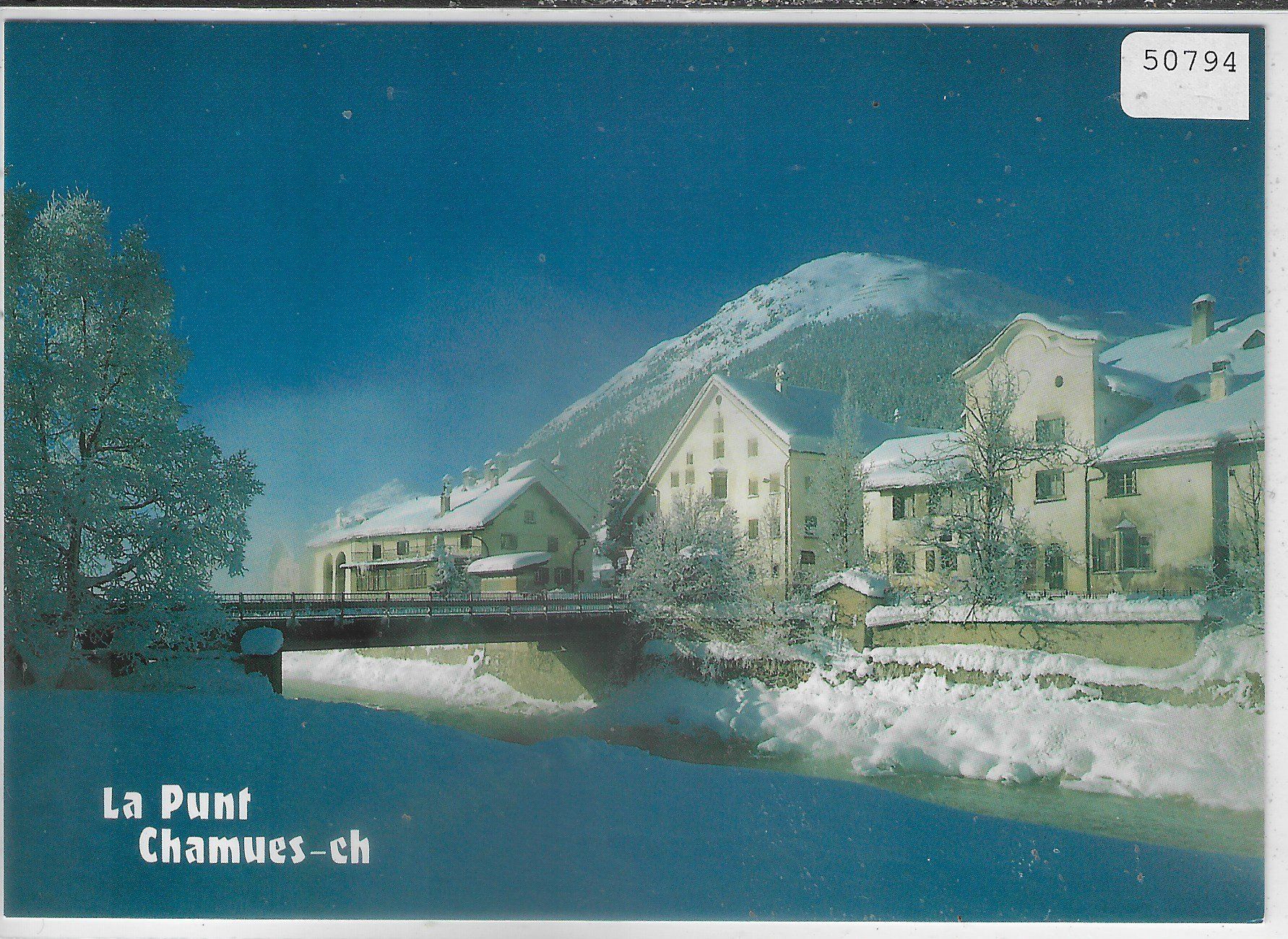 Cartes postales: La Punt Chamues-ch im Winter – D'occasion à Ettingen par Kartenplanet