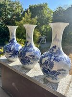 Vases blue white porcelain set of three landscape motif