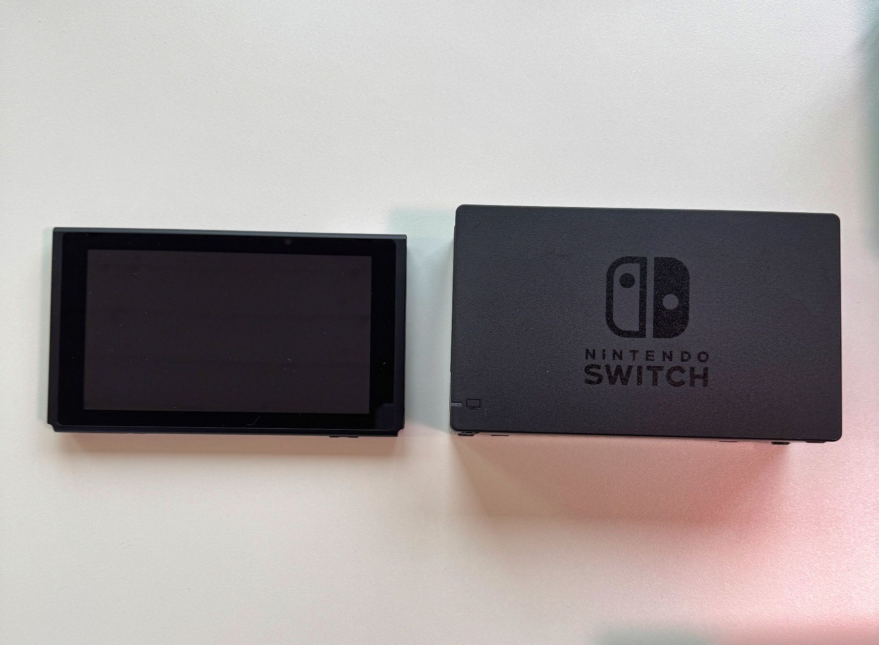 Nintendo Konsolen: Nintendo Switch (V2 Modell) + 2 Controller + Ladestation – Gebraucht aus Windisch von Rabis 5