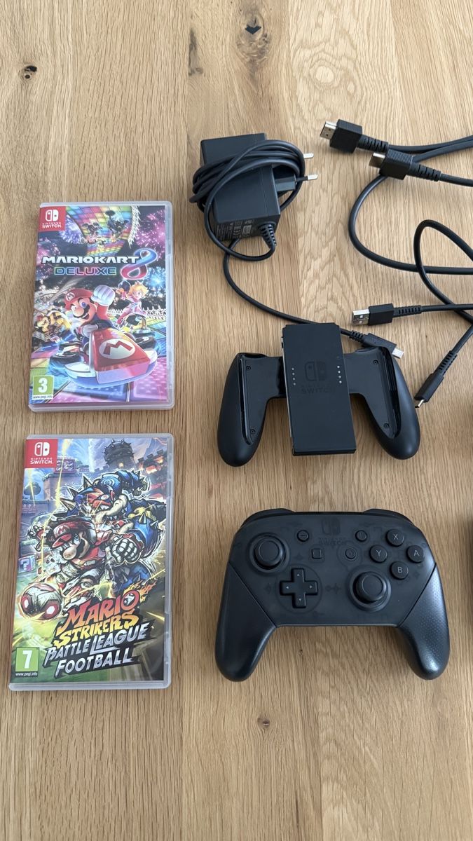 Nintendo Console: Nintendo Switch inkl. Controller und Spiele – Nuovo (secondo la descrizione) da Interlaken venduto da xCarlos3 1