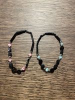 2 Partnerarmbänder, schwarz mit Steinchen