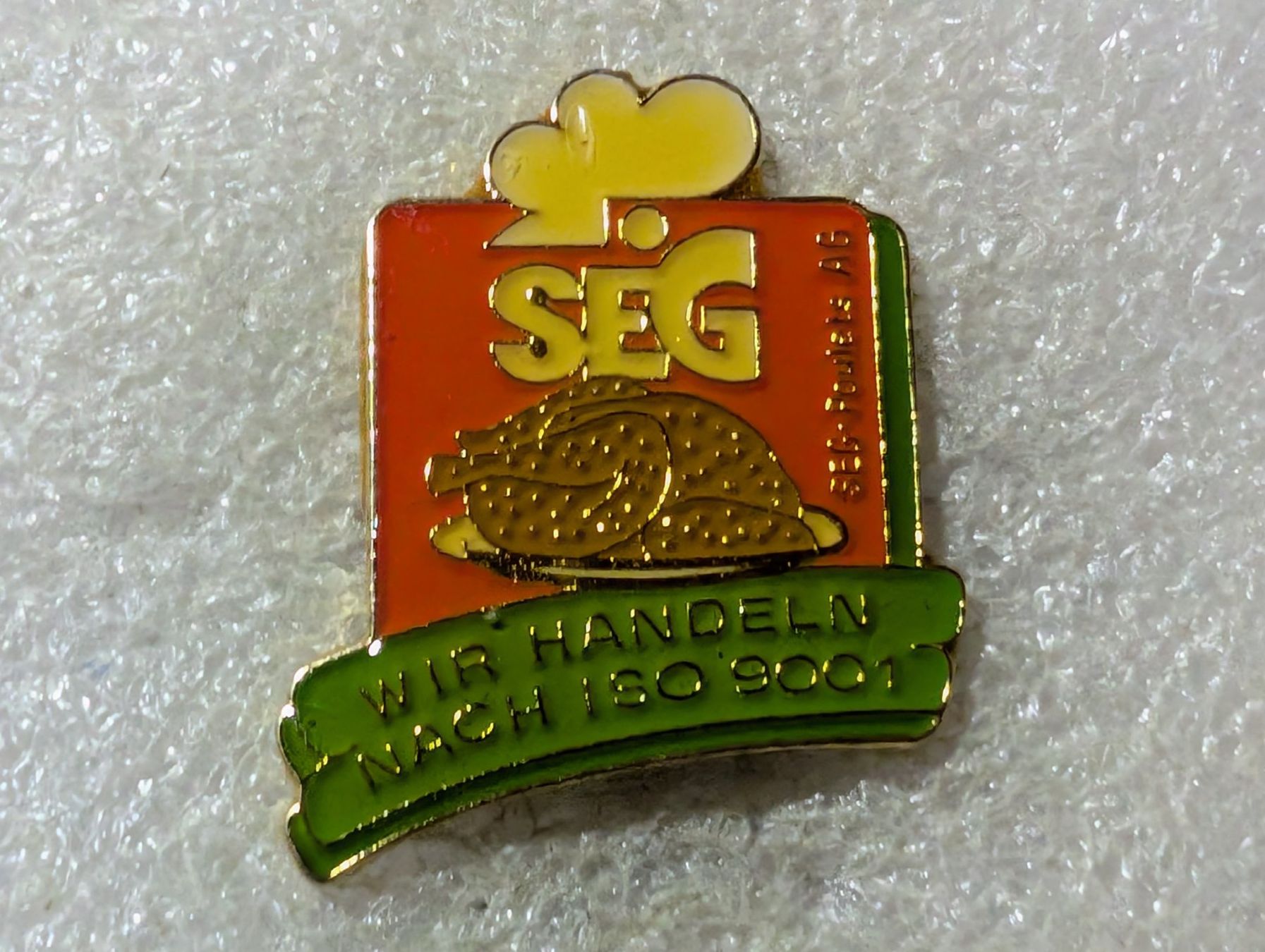 Placchette & Badge: Ansteckpin 117: SEG – Usato da Oppligen venduto da Pin-Fall-Shop
