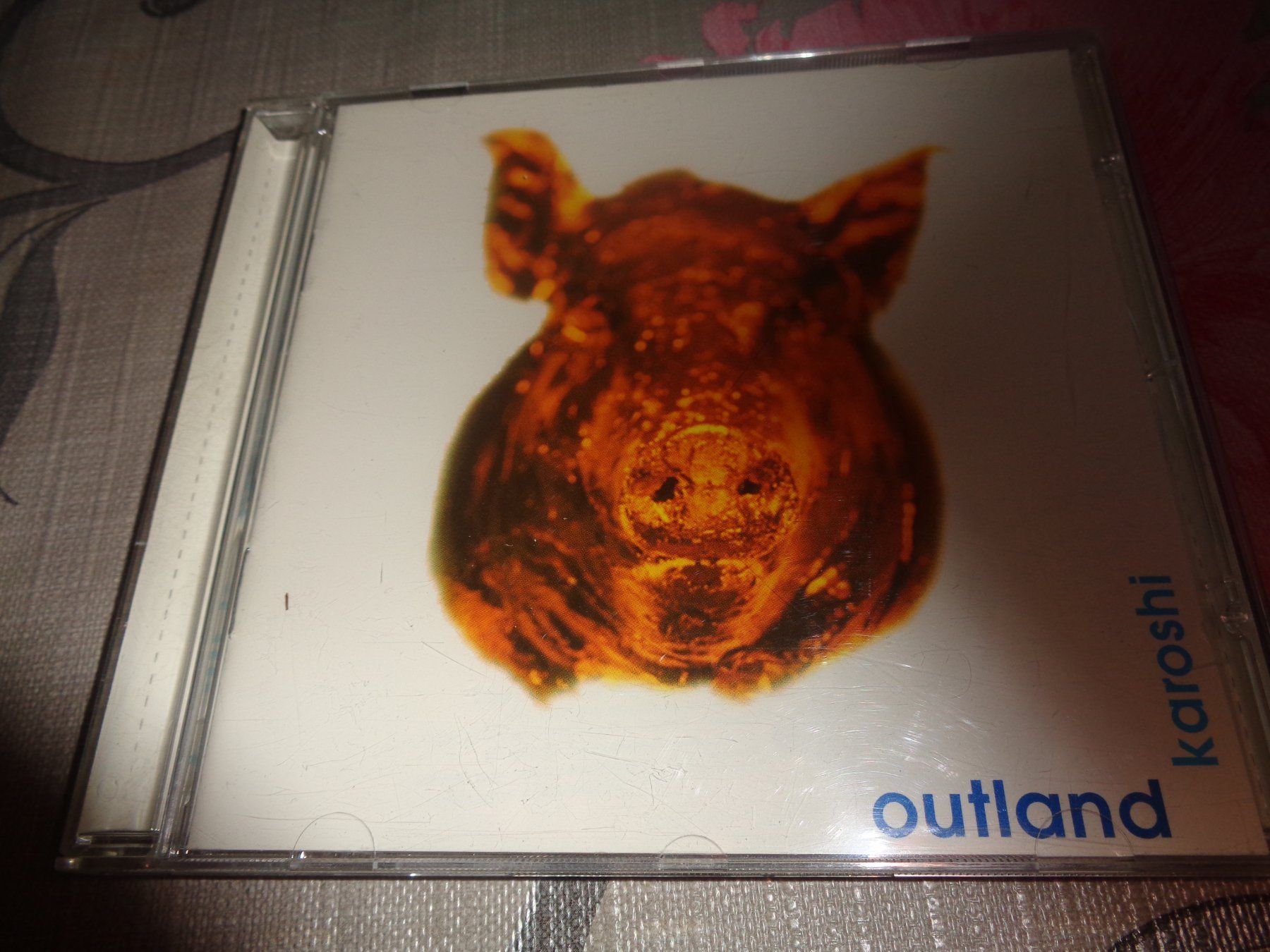CDs: Outland - Karoshi CD – Gebraucht aus Olten von Disc-Ausverkauf