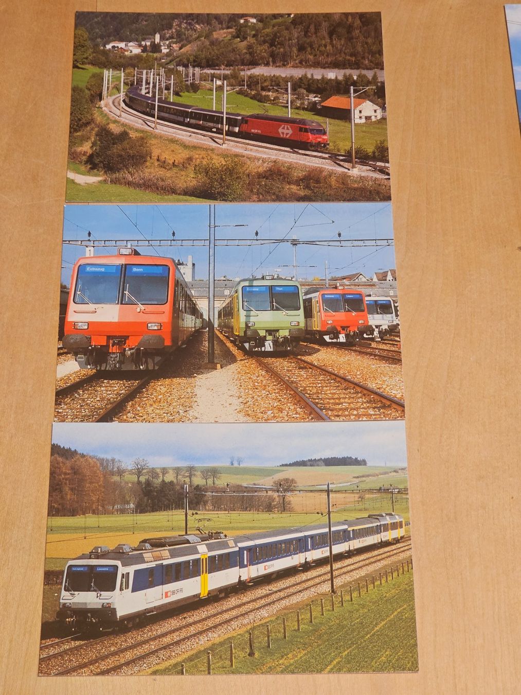 Cartoline postali: 3 Ansichtskarten SBB, Re 460, RBDe 4/4 + Bt, Pendelzug – Nuovo (secondo la descrizione) da Pfäffikon ZH venduto da Gugus60
