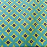 Beschichtete Baumwolle Spitzquadrate mint/gelb