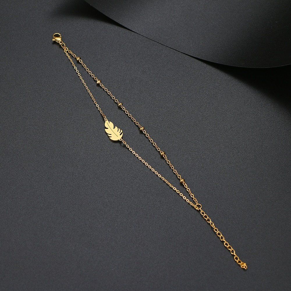 Armbänder & -reifen: Edelstahl Armband mit "Feder" Anhänger in GOLD – Neu und originalverpackt aus Tumegl/Tomils von Steinschleuder-Shop 2