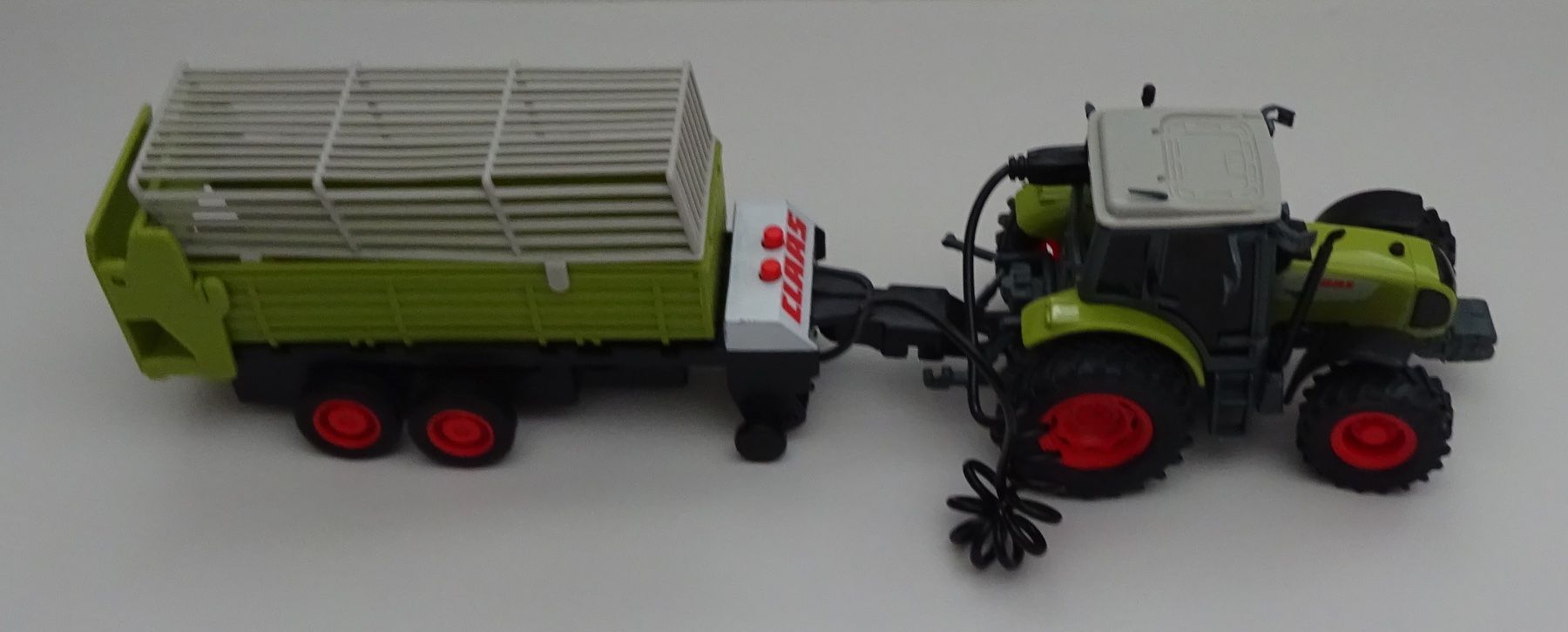 Giocattoli: Claas Traktor mit Anhänger – Usato da Wagenhausen venduto da Svema