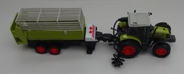 Claas Traktor mit Anhänger