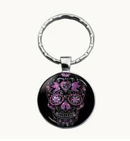 SCHLÜSSELANHÄNGER TOTENKOPF, LEGIERUNG,GLAS,NEU