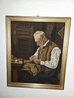 Albert Anker Schuhmacher Stickbild mit Goldrahmen
