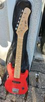 Kindergitarre mit Verstärker