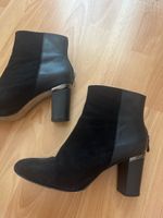 Bottines à talon noires en cuir et daim Roberto Botella