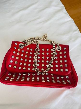 borsa di vera pelle con borchie